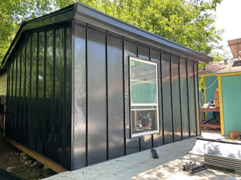 Black standing seam metal wall panels for Metal Roof Installation in Claremont